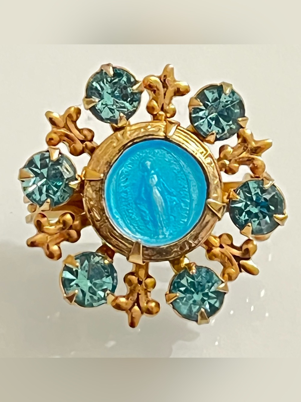 Vintage Religious Gold Tone Fleur De Lis Madonna Mother Mary Pin Blue Accents